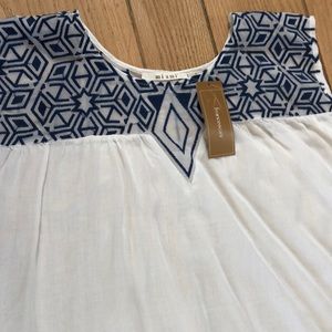 Francesca’s blue and white top